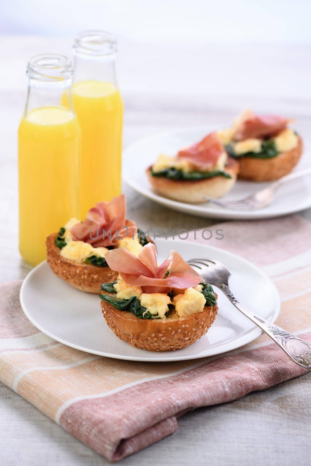 Breakfast. Bun with cheese, spinach, ham by Apolonia