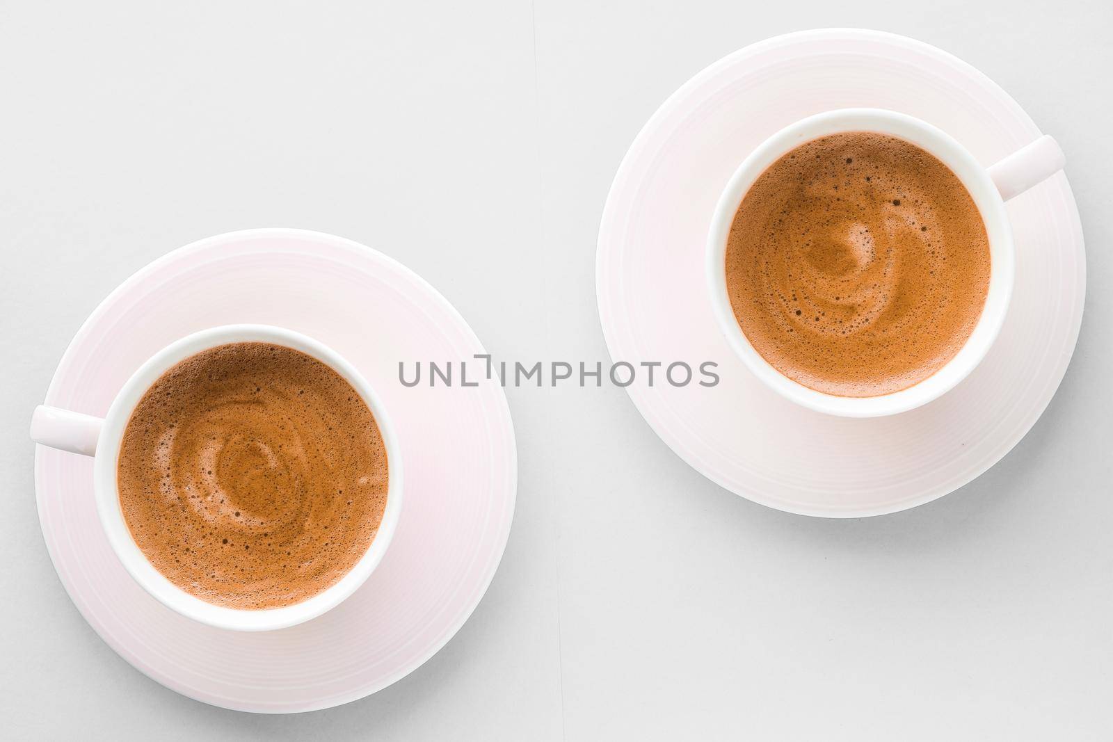 Cup of hot french coffee as breakfast drink, flatlay cups on white background by Anneleven