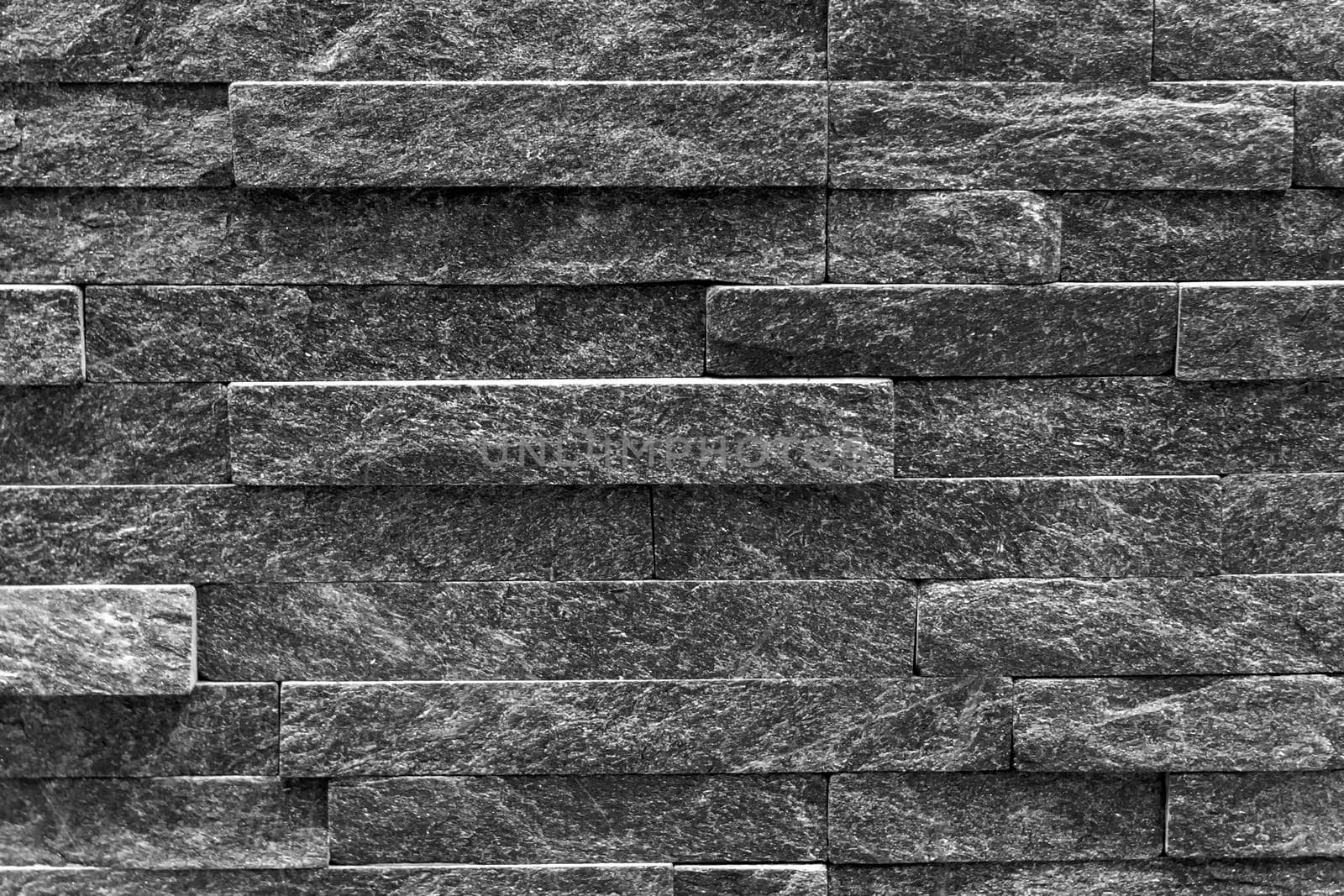 Gray Background is made of artificial stone. Side view, indoors horizontal shot. by Essffes