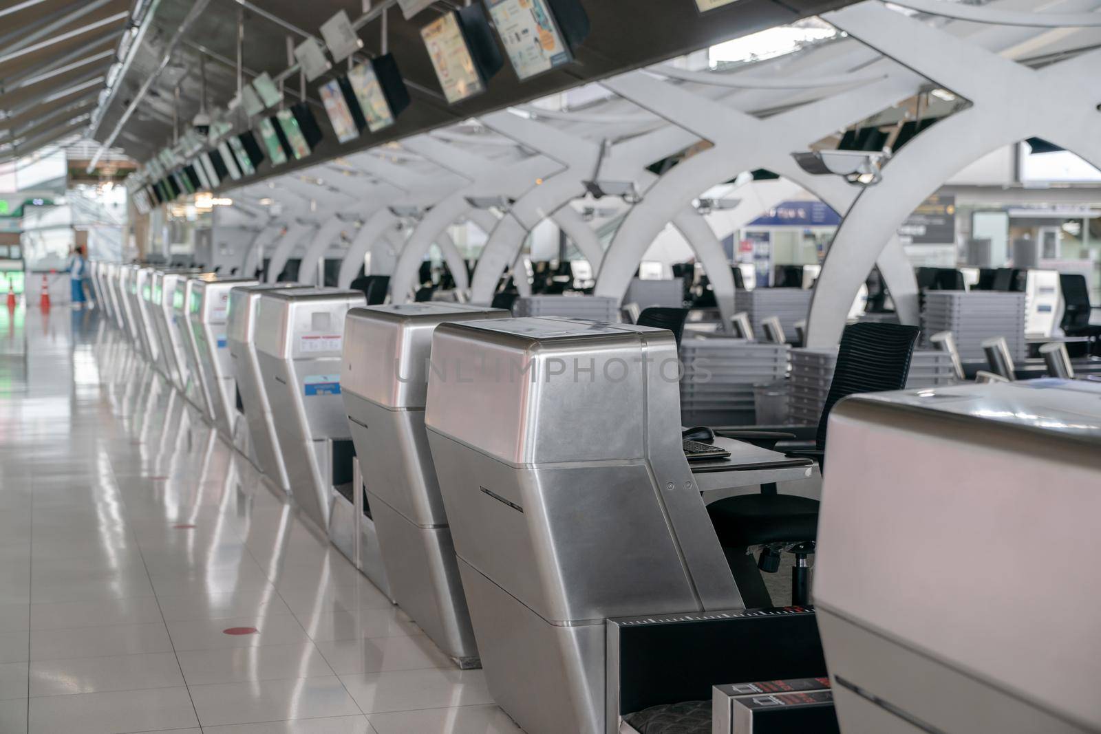 The empty public check-in area at airport. by sirawit99