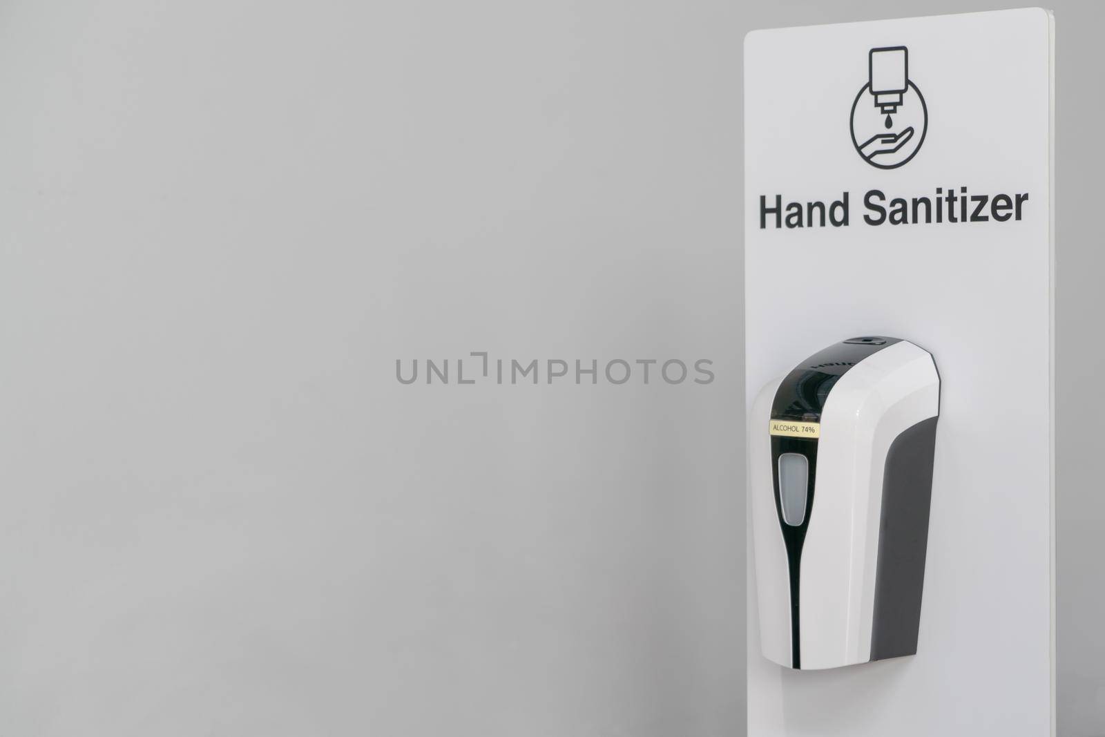 Automatic alcohol dispenser. Sanitation station for cleaning of hands.
