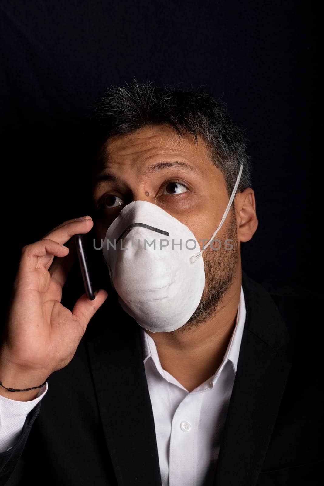 Young handsome with medical mask talking on his phone by eagg13
