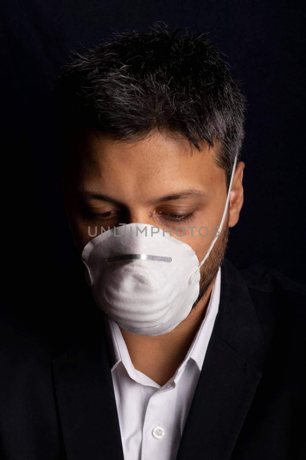 Young handsome with medical mask to prevent the spread of contagious viruses or chemical gases