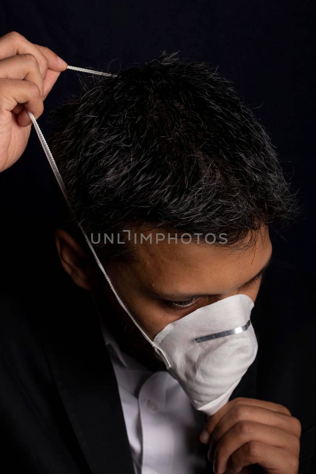Young handsome with medical mask to prevent the spread of contagious viruses or chemical gases by eagg13
