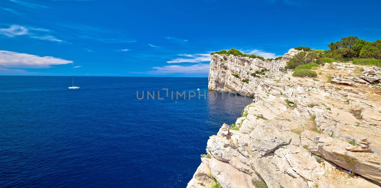 Kornati archipelago national park. Spectacular cliffs of Telascica bay above blue Adriatic sea by xbrchx