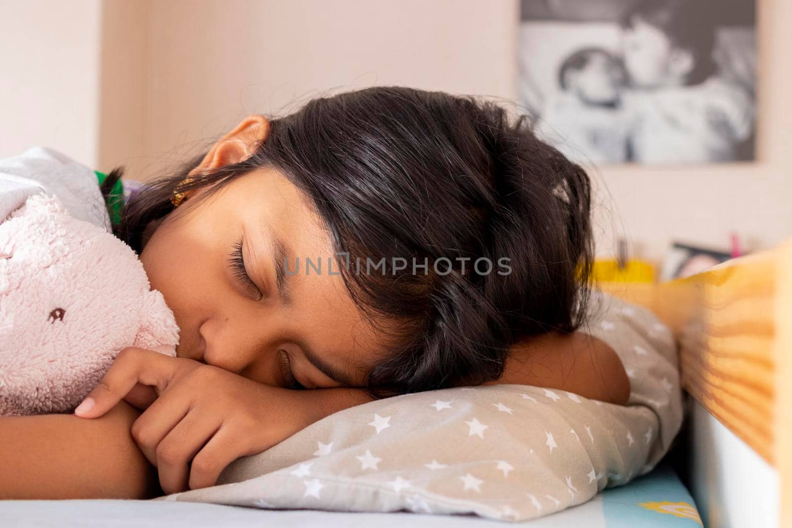 Little girl sleeping on her bed inside her room by eagg13