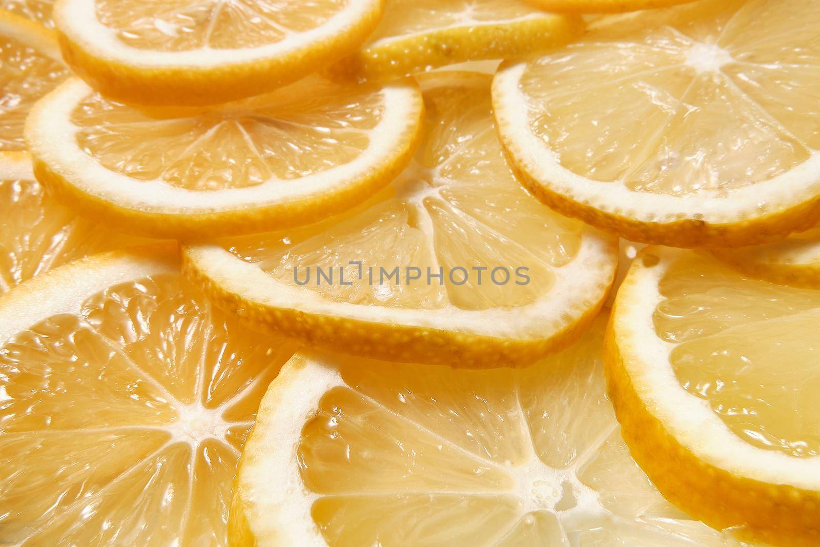 Round slices of fresh lemon close up
