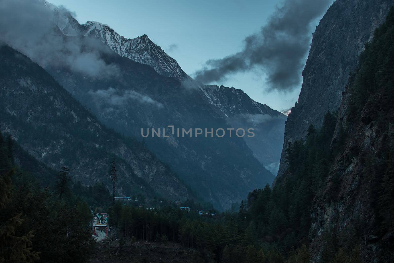 View over nepalese mountain village in valley gorge trekking Annapurna circuit, Himalaya, Nepal, Asia