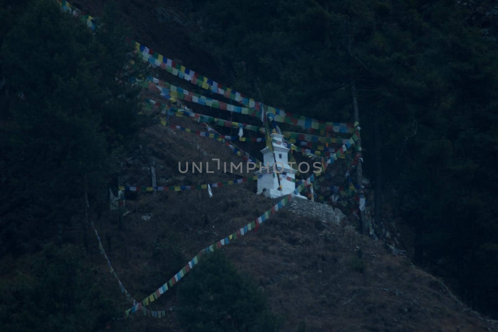 Buddhist stupa and prayer flags on the mountain side, Chame, Annapurna circuit, Himalaya, Nepal, Asia