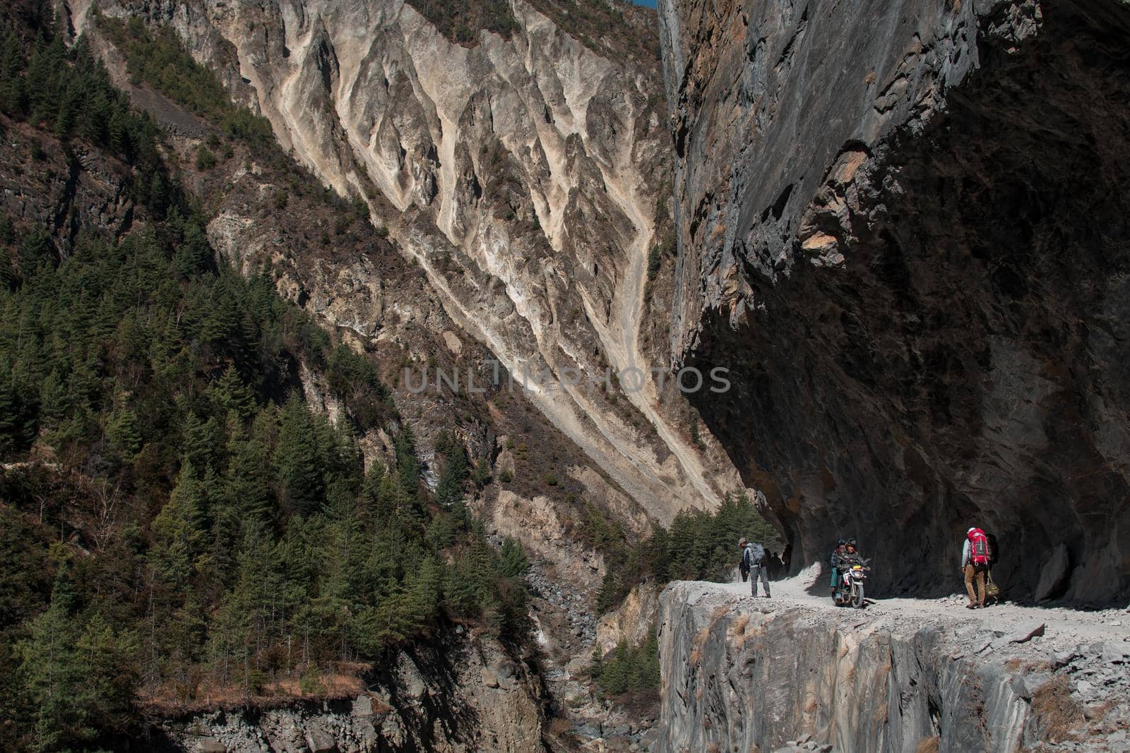 Trekking Annapurna circuit, steep edge cliff down to Marshyangdi river, Himalaya, Nepal, Asia