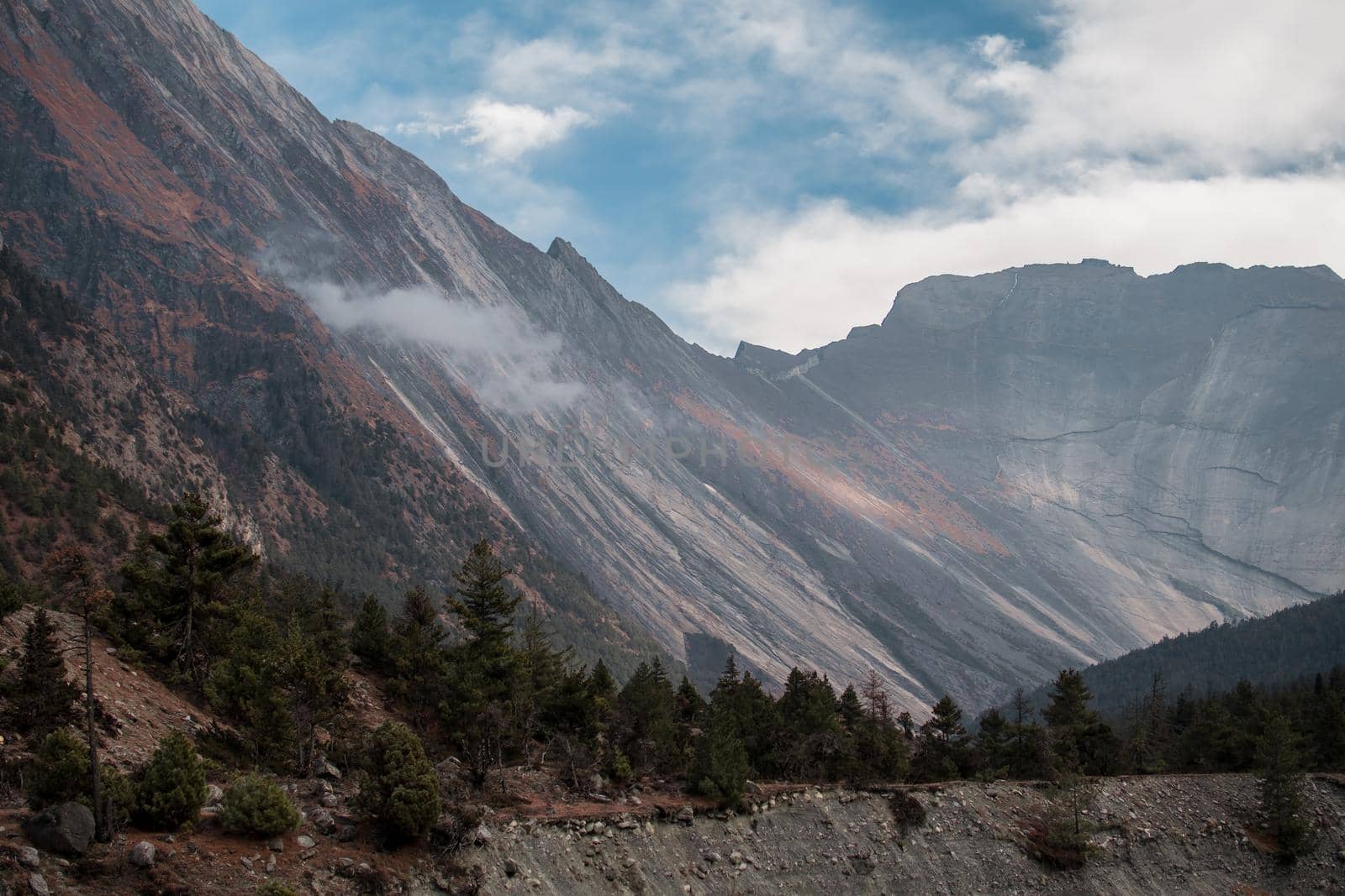 Mountain wall by Upper Pisang sunny day December, Annapurna circuit, Nepal