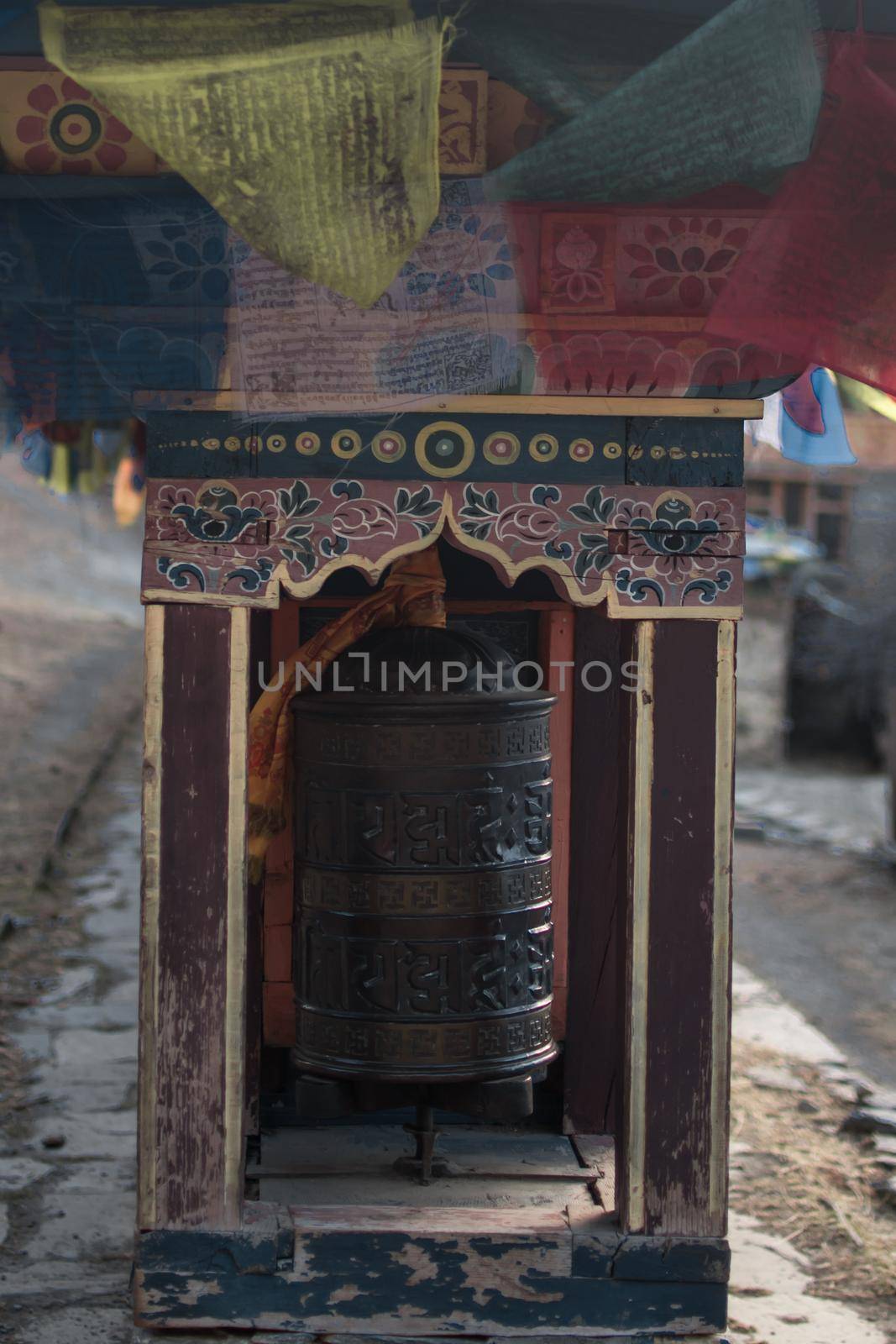 Buddhist prayer wheels and flags, Upper Pisang by arvidnorberg