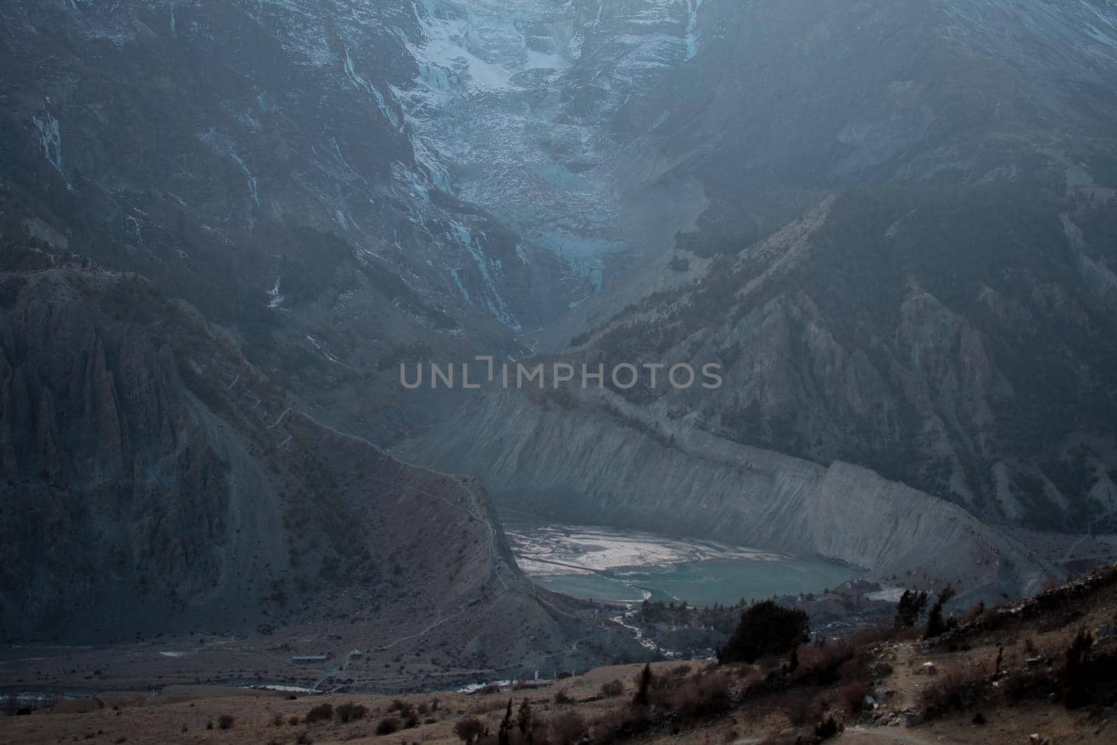 Mountain glacier over Manang village, trekking Annapurna circuit, Himalaya, Nepal