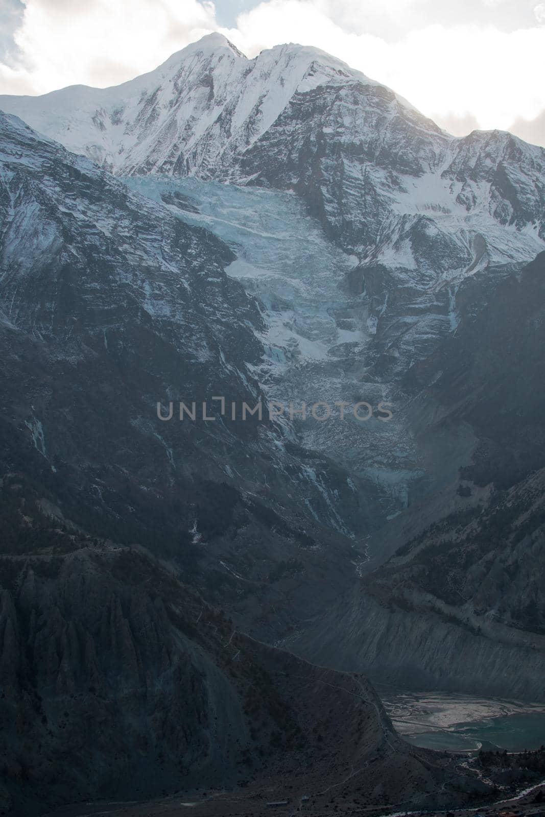 Mountain glacier over Manang village, trekking Annapurna circuit, Himalaya, Nepal