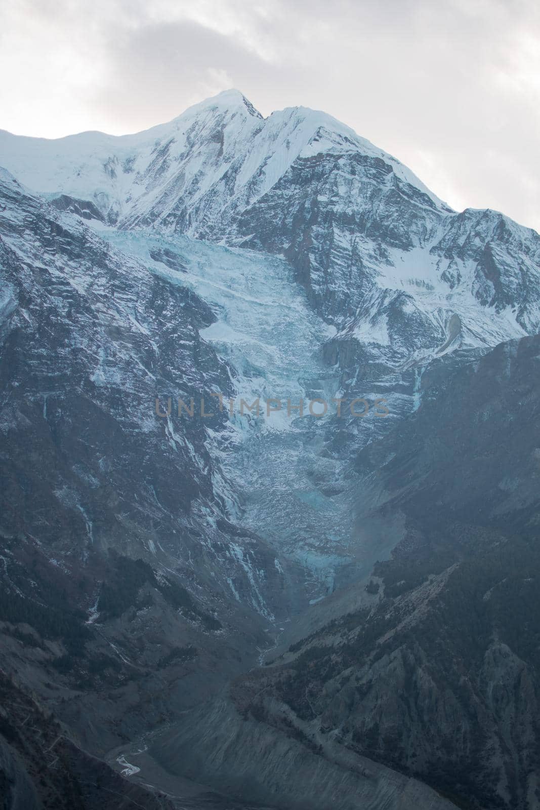 Mountain glacier over Manang village by arvidnorberg