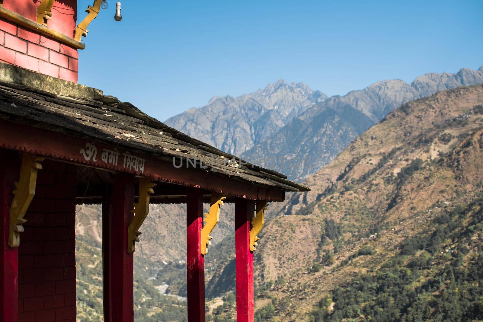 Red buddhist building in the nepalese mountains in Bahundanda, Annapurna circuit