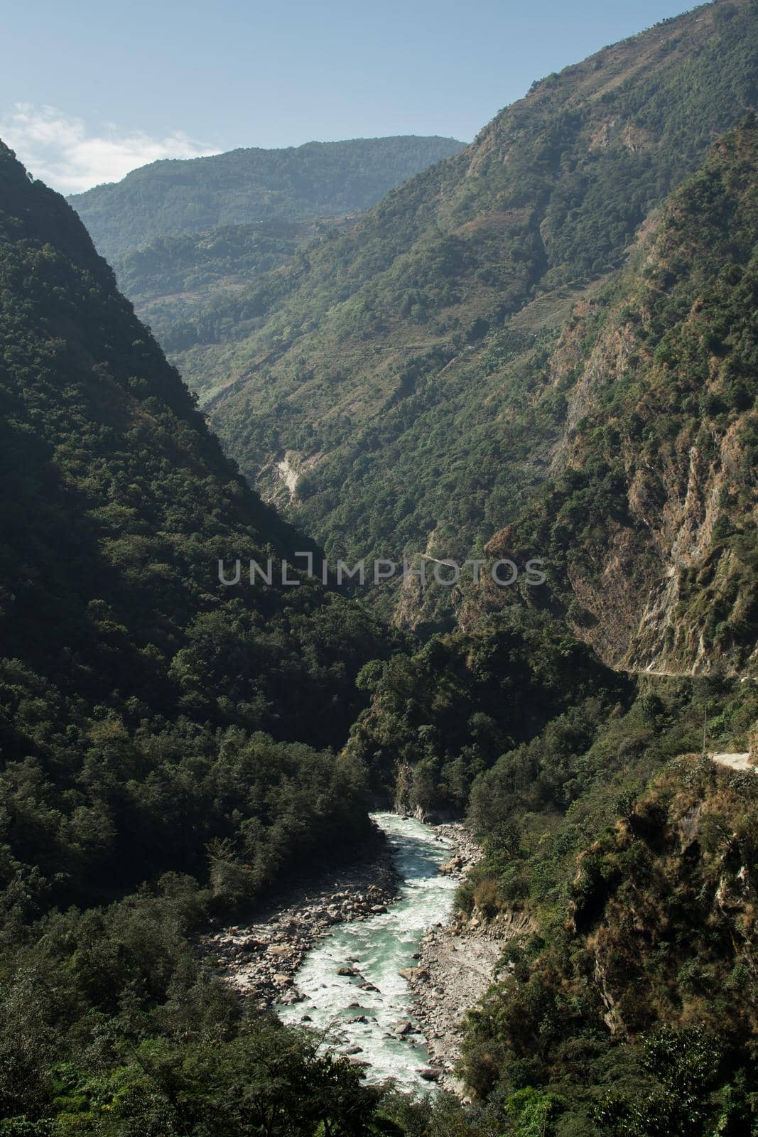 Turquosie Marshyangdi river flowing through a valley by arvidnorberg