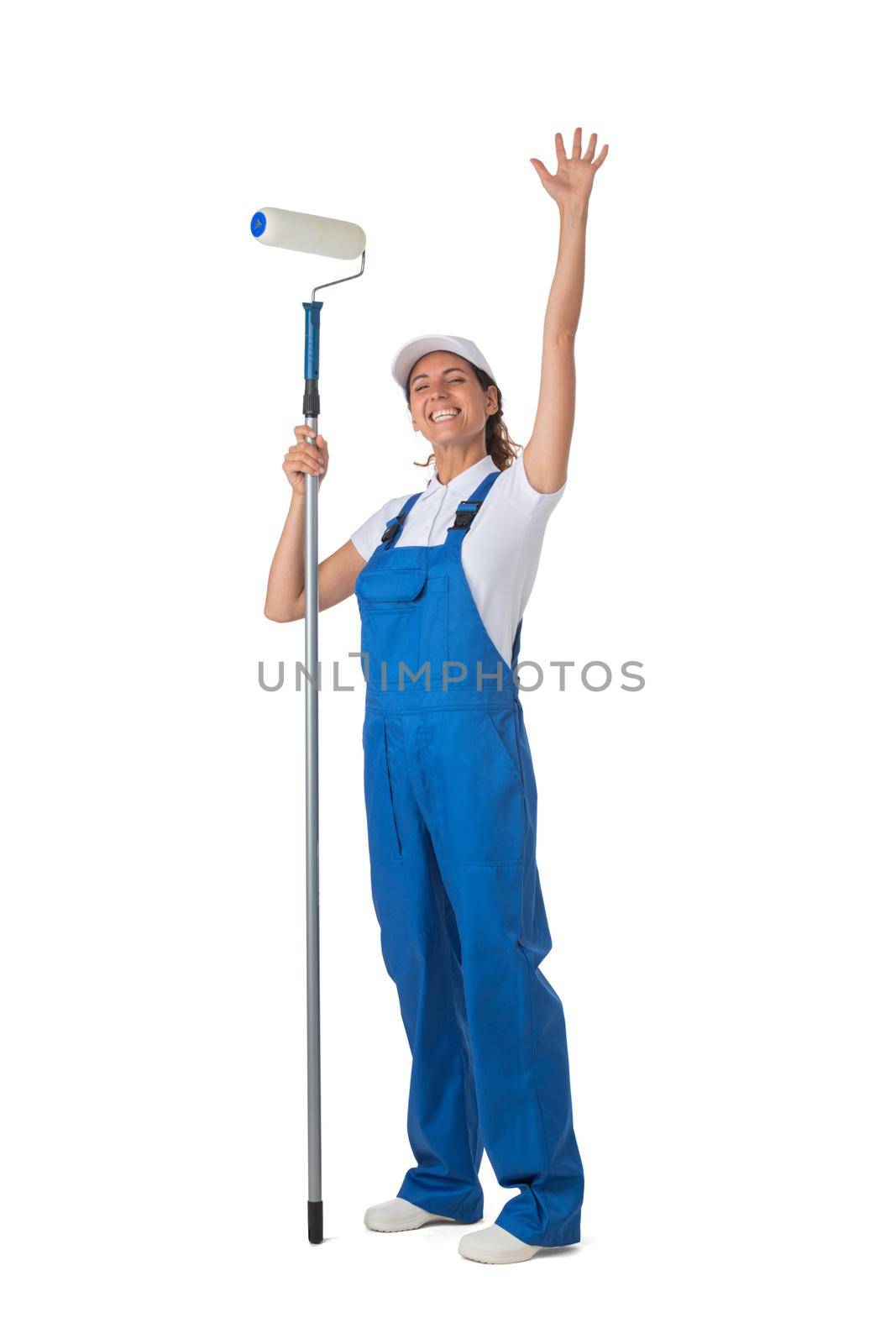 Female house painter with paint roller raised arms isolated on white background full length studio portrait