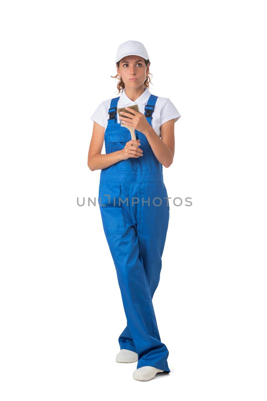 Female house painter with paint brush isolated on white background, full length portrait