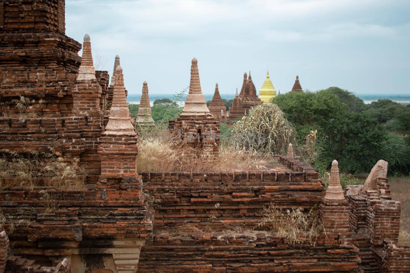 BAGAN, NYAUNG-U, MYANMAR - 2 JANUARY 2020: A few historical and religious pagoda temples from the old Pagan kingdom