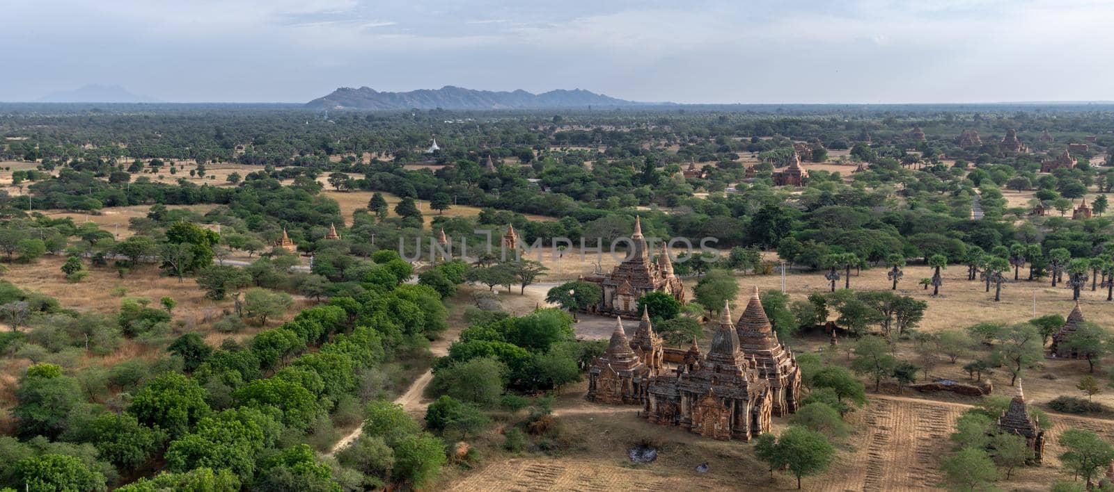 BAGAN, NYAUNG-U, MYANMAR - 3 JANUARY 2020: Looking out over the vast plains of Bagan with its historical temples and fields from the tall Nan Myint viewing tower