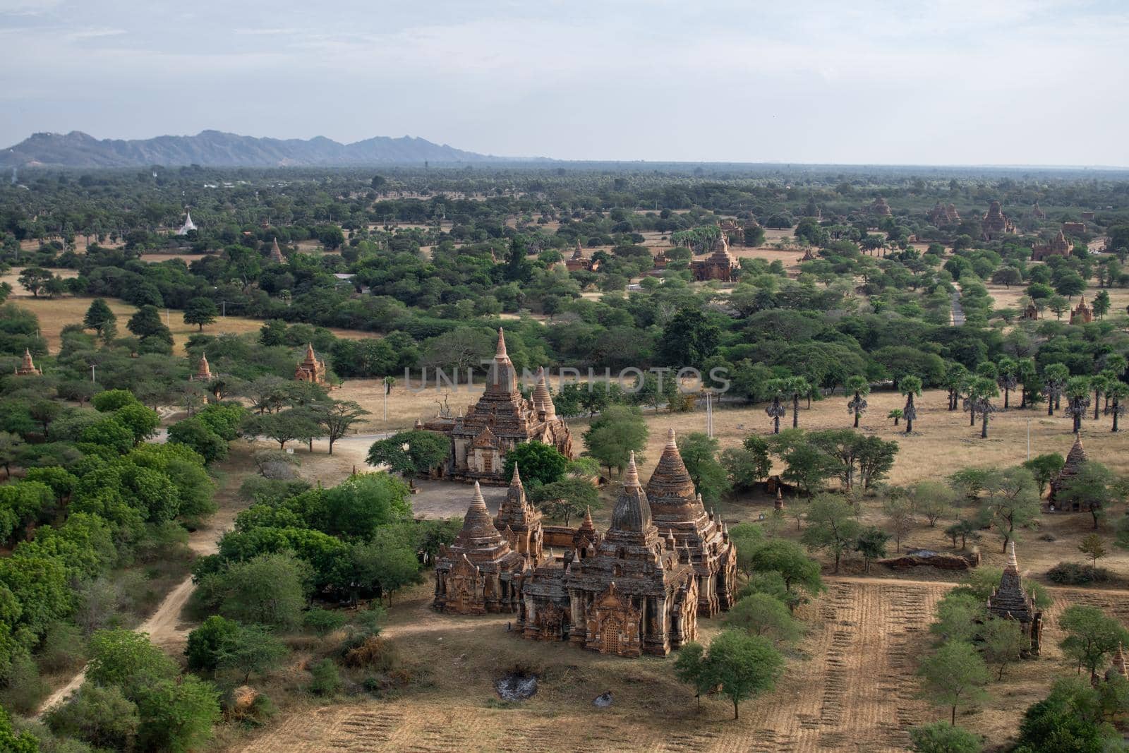 BAGAN, NYAUNG-U, MYANMAR - 3 JANUARY 2020: Looking out over the vast plains of Bagan with its historical temples and fields from the tall Nan Myint viewing tower