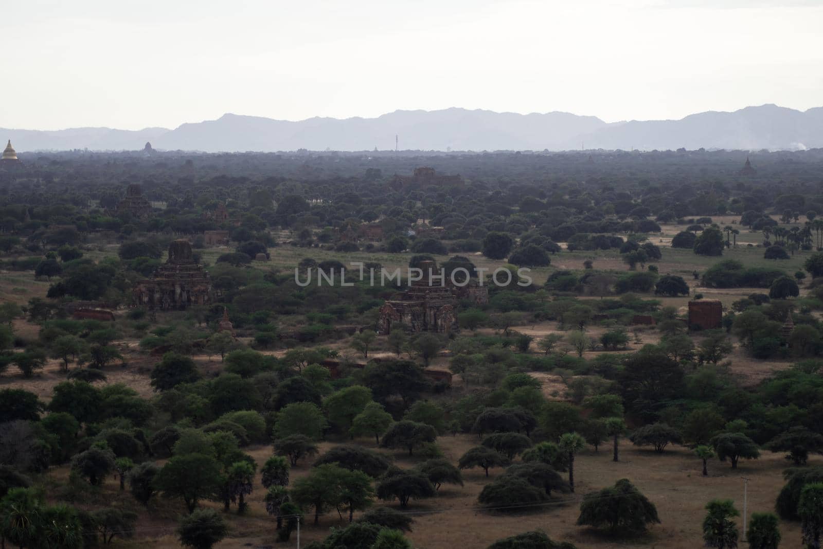 BAGAN, NYAUNG-U, MYANMAR - 3 JANUARY 2020: Looking out over the vast plains of Bagan with its historical temples and fields from the tall Nan Myint viewing tower