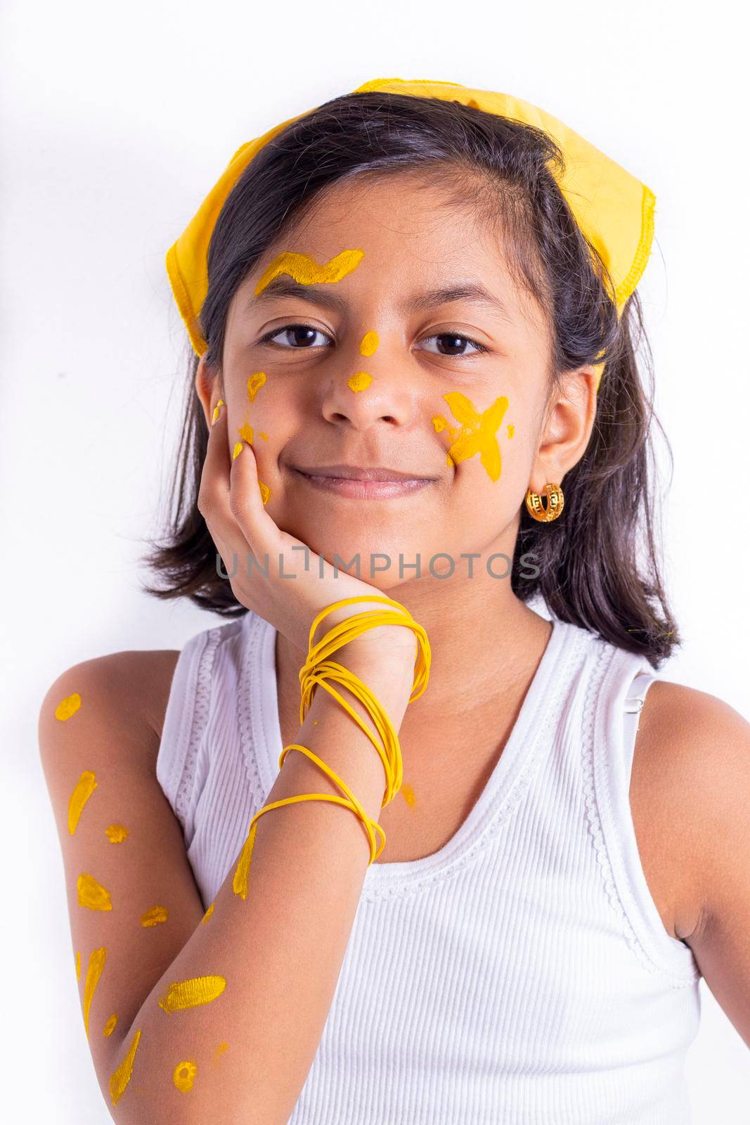 Happy little girl, with her face painted to celebrate the yellow day by eagg13