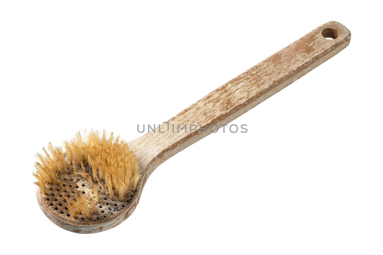 Old and dirty ruined wooden bath body brush or shower back scrubber with long handle isolated on white background, natural hair boar bristle