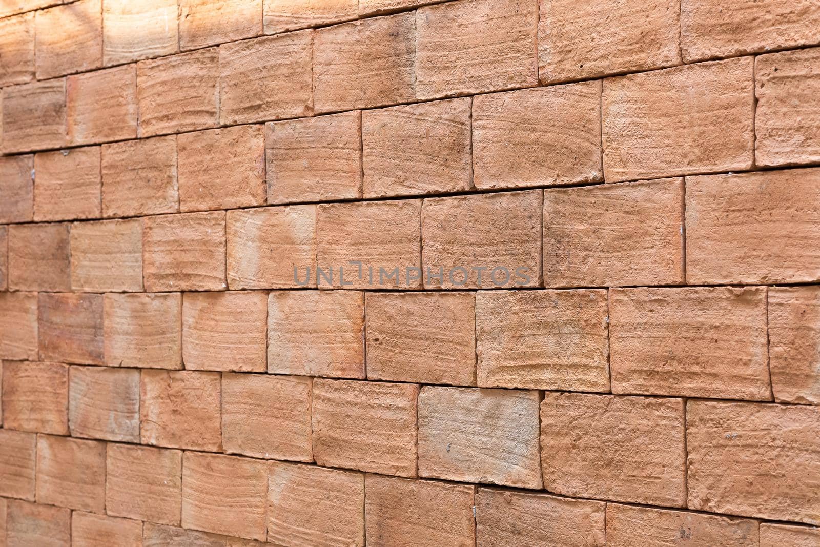 Close up old red brick wall seamless background, brown retro grunge pattern surface architecture structure
