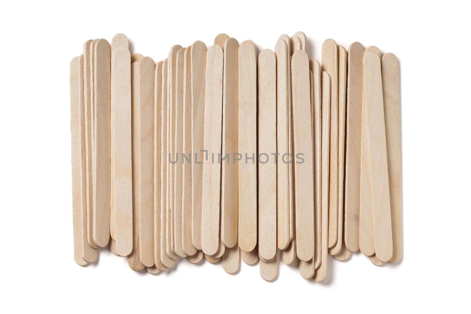 Closeup stack of wooden ice cream stick isolated on white
