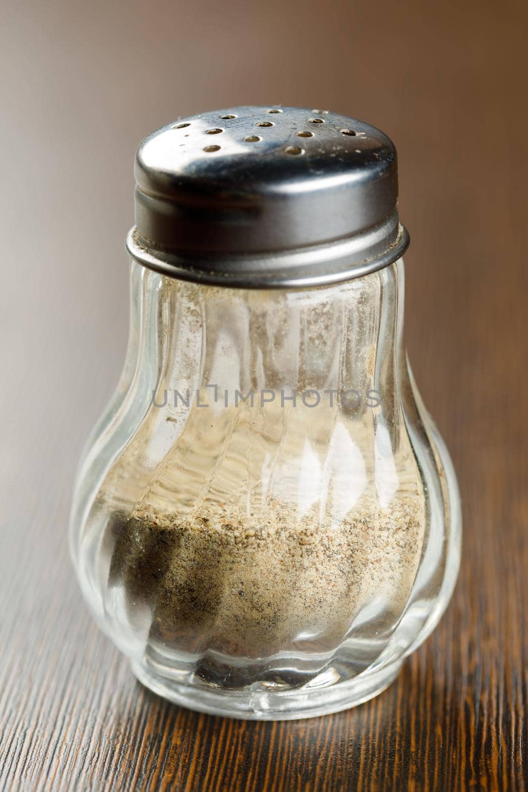 Ground white pepper in glass bottle by smuay