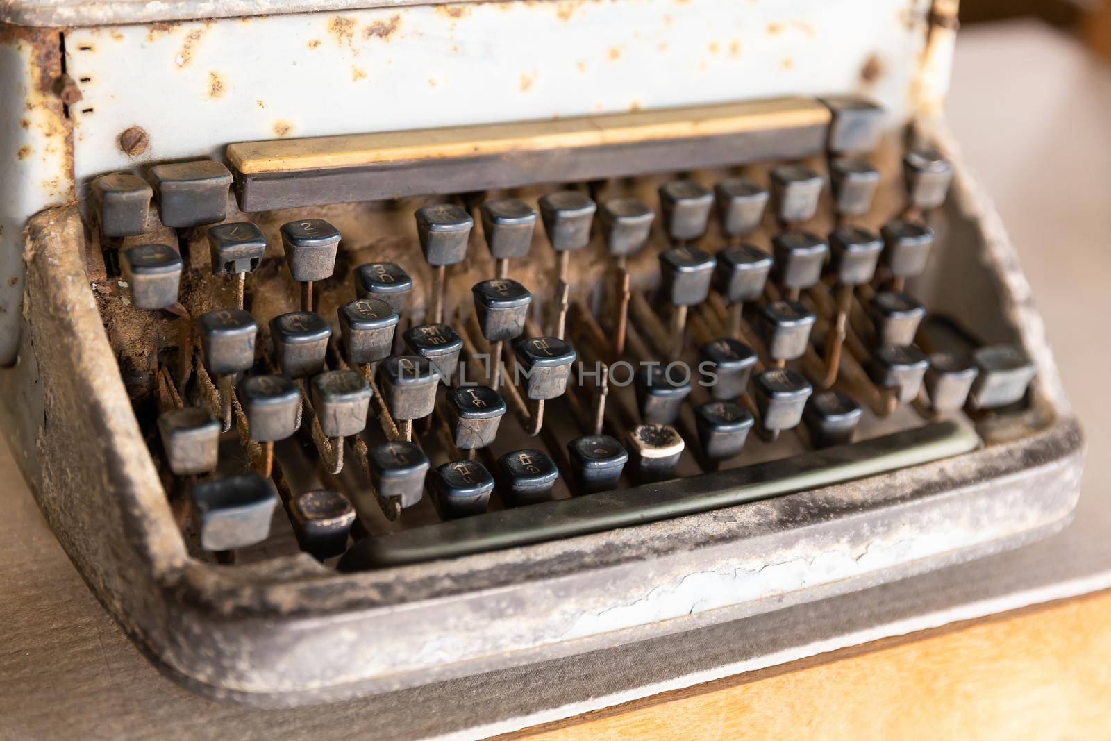 Closeup old and rusty type writer key, Thai language