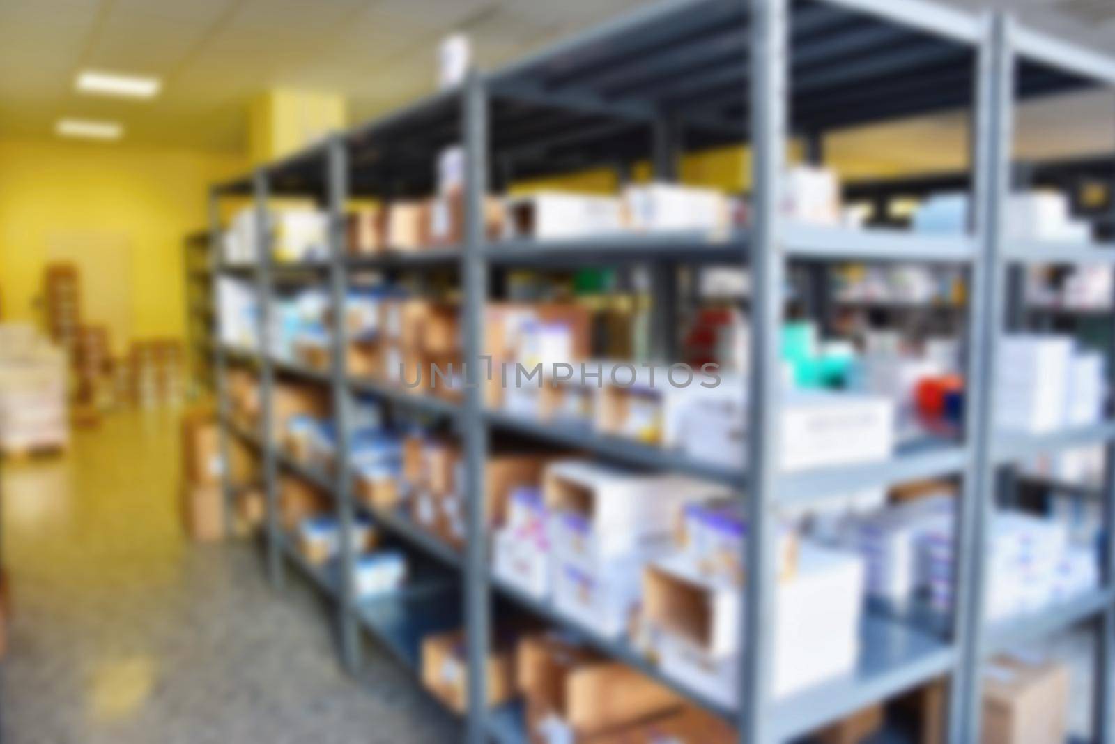 Blurred background. Interior of a pharmacy with goods and showcases. Medicines and vitamins for health. Shop concept, medicine and healthy lifestyle