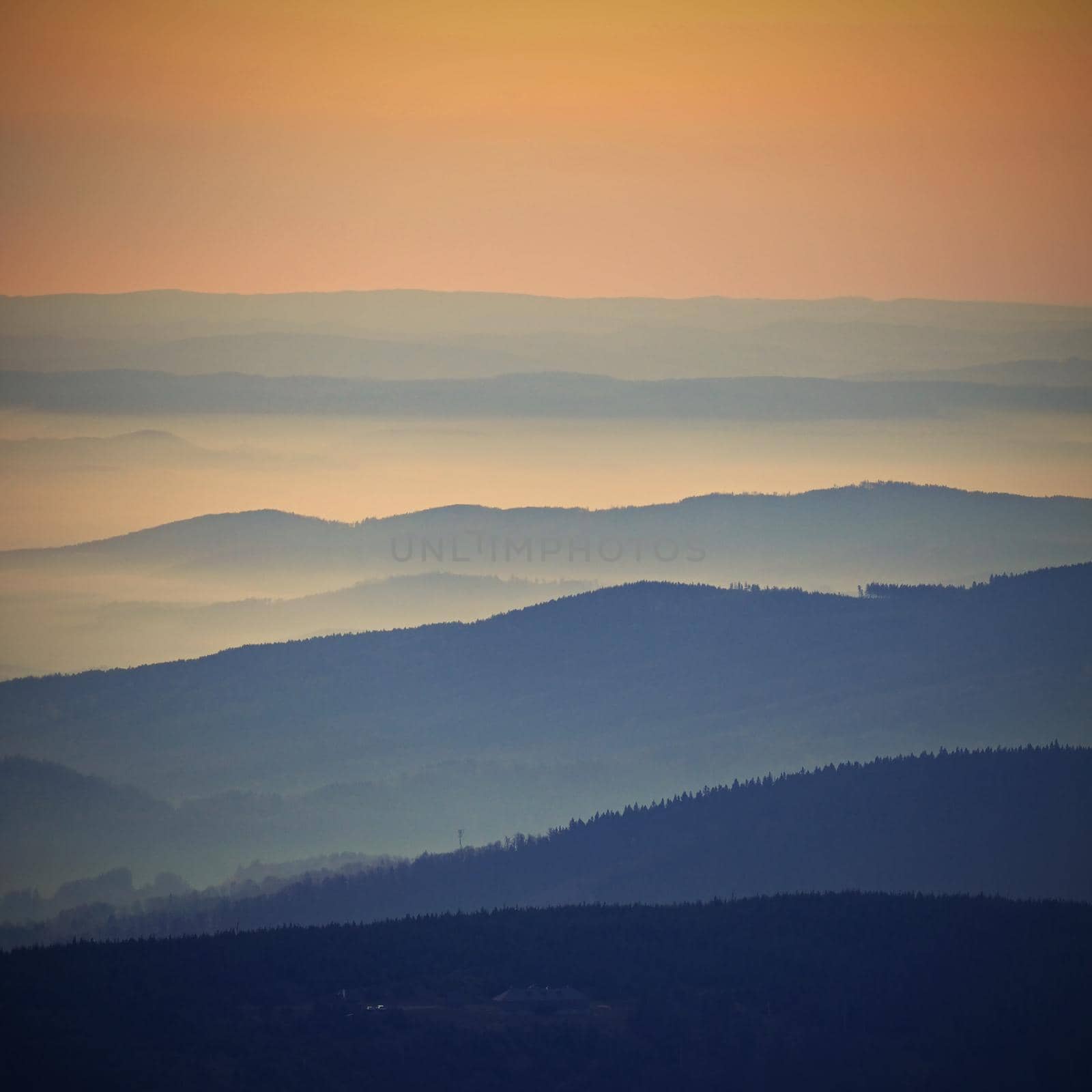 Beautiful landscape and sunset in the mountains. Hills in clouds. Jeseniky - Czech Republic - Europe.