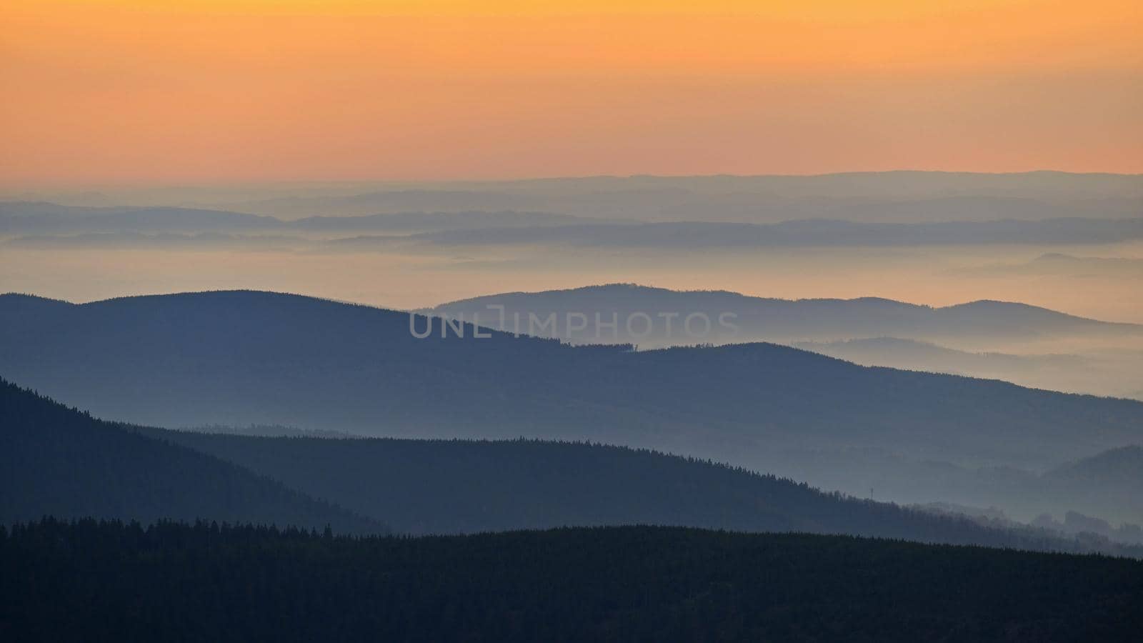 Beautiful landscape and sunset in the mountains. Hills in clouds. Jeseniky - Czech Republic - Europe. by Montypeter