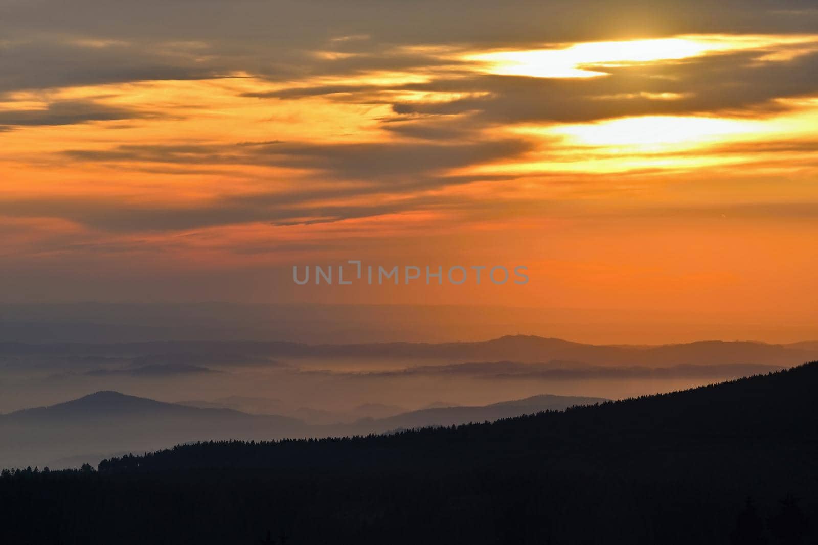 Beautiful landscape and sunset in the mountains. Hills in clouds. Jeseniky - Czech Republic - Europe. by Montypeter