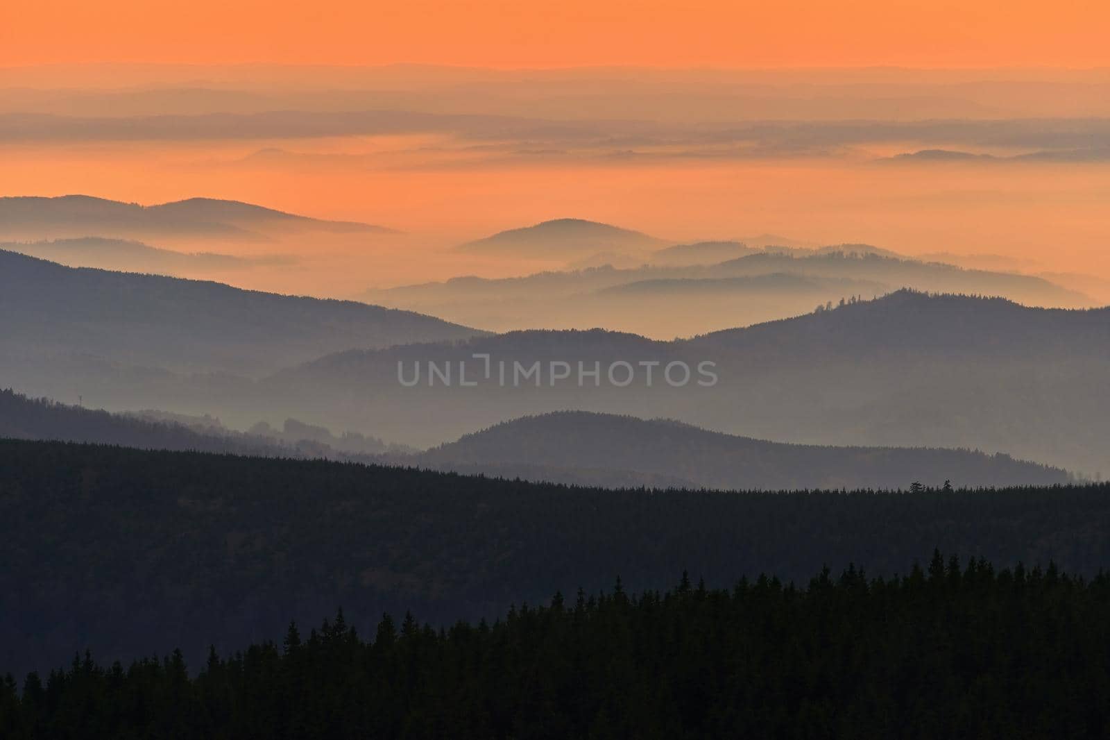 Beautiful landscape and sunset in the mountains. Hills in clouds. Jeseniky - Czech Republic - Europe.