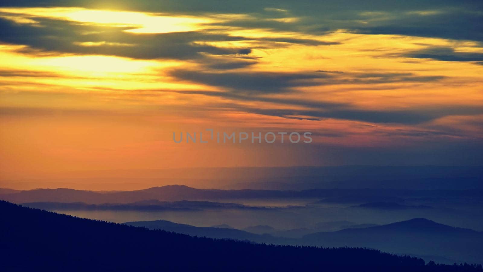 Beautiful landscape and sunset in the mountains. Hills in clouds. Jeseniky - Czech Republic - Europe. by Montypeter