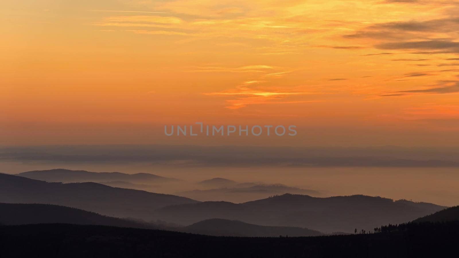 Beautiful landscape and sunset in the mountains. Hills in clouds. Jeseniky - Czech Republic - Europe.