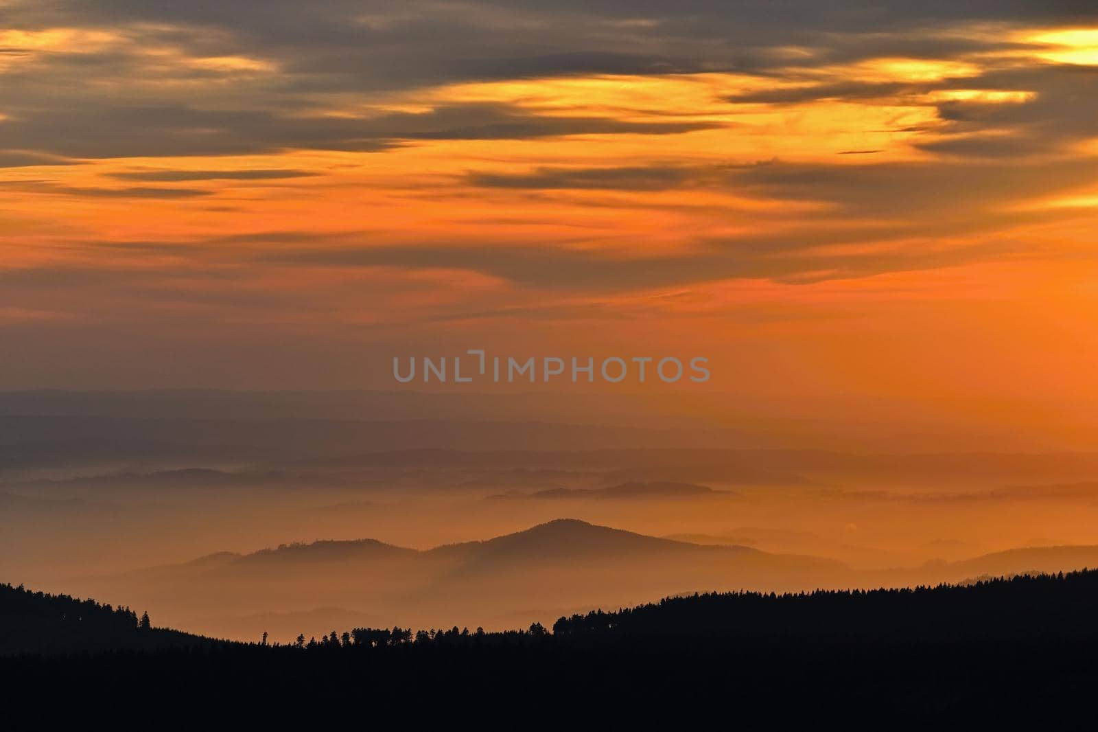 Beautiful landscape and sunset in the mountains. Hills in clouds. Jeseniky - Czech Republic - Europe. by Montypeter