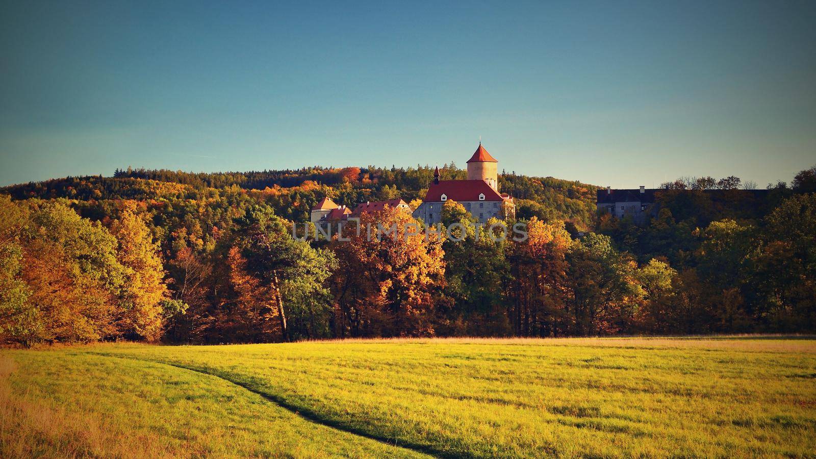 Beautiful Autumn Landscape with Veveri Castle. Natural colorful scenery with sunset. Brno dam-Czech Republic-Europe.