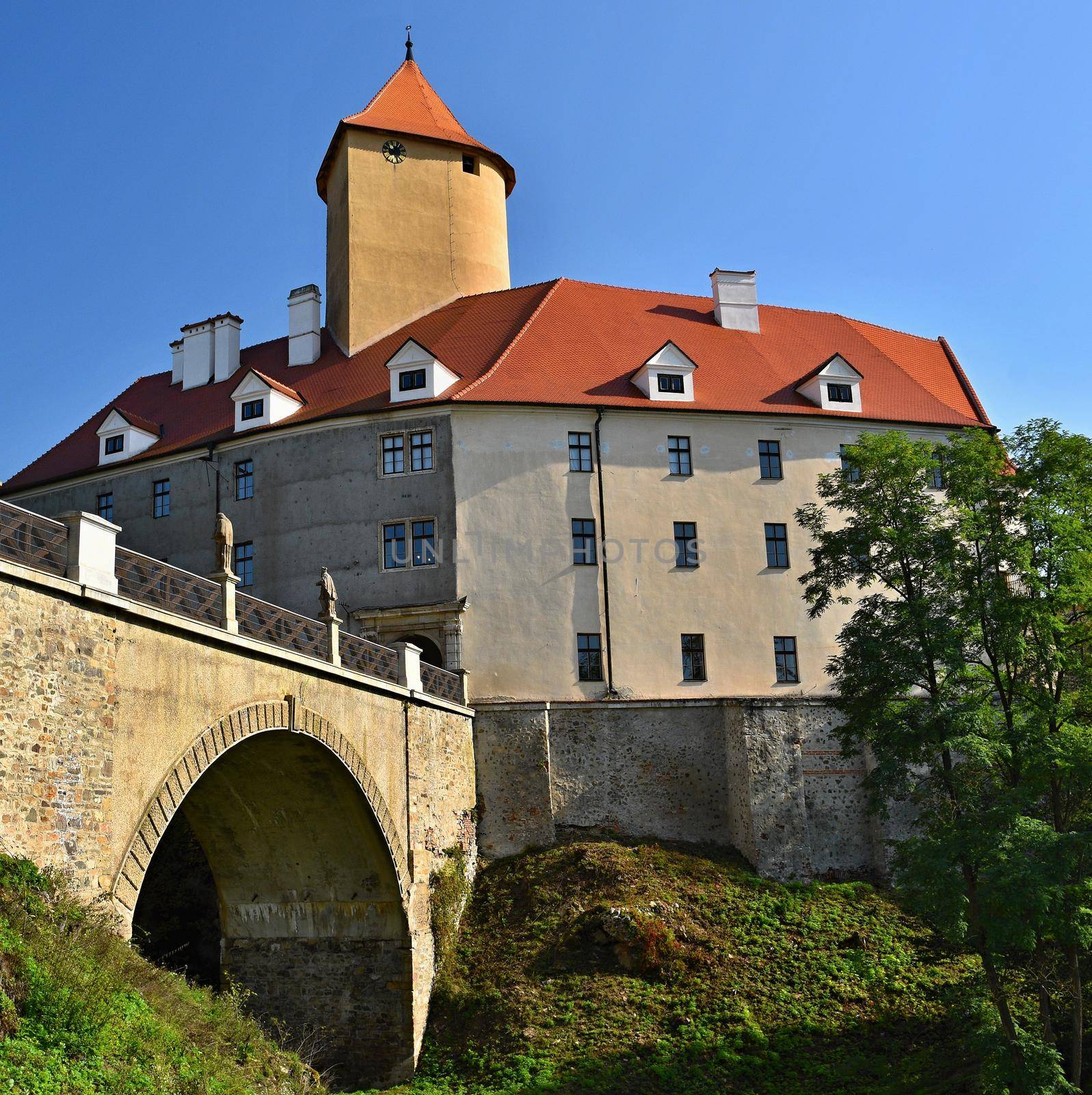 Beautiful Gothic castle Veveri. The city of Brno at the Brno dam. South Moravia - Czech Republic - Central Europe. by Montypeter