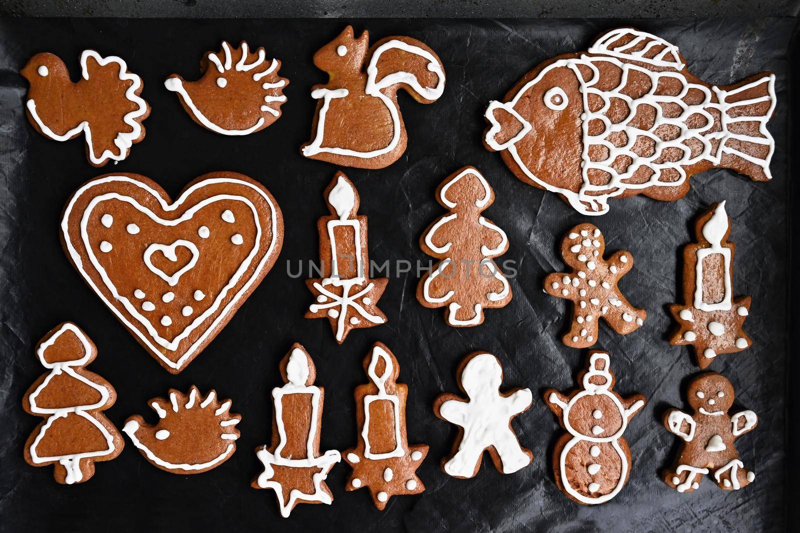 Traditional Czech Christmas cookies. Hand decorated and baked honey gingerbread with sugar icing. by Montypeter