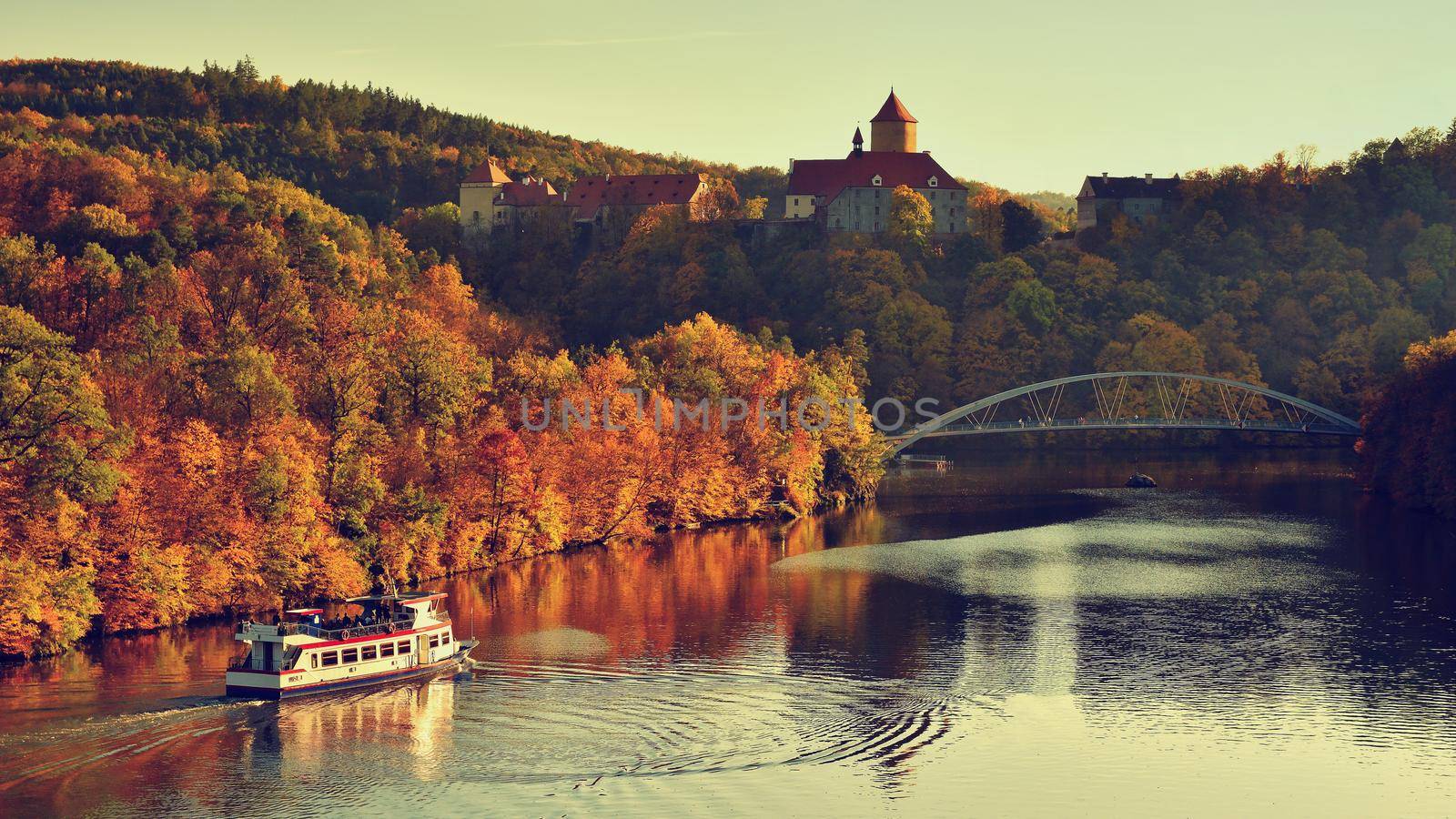 Beautiful Autumn Landscape with Veveri Castle. Natural colorful scenery with sunset. Brno dam-Czech Republic-Europe.