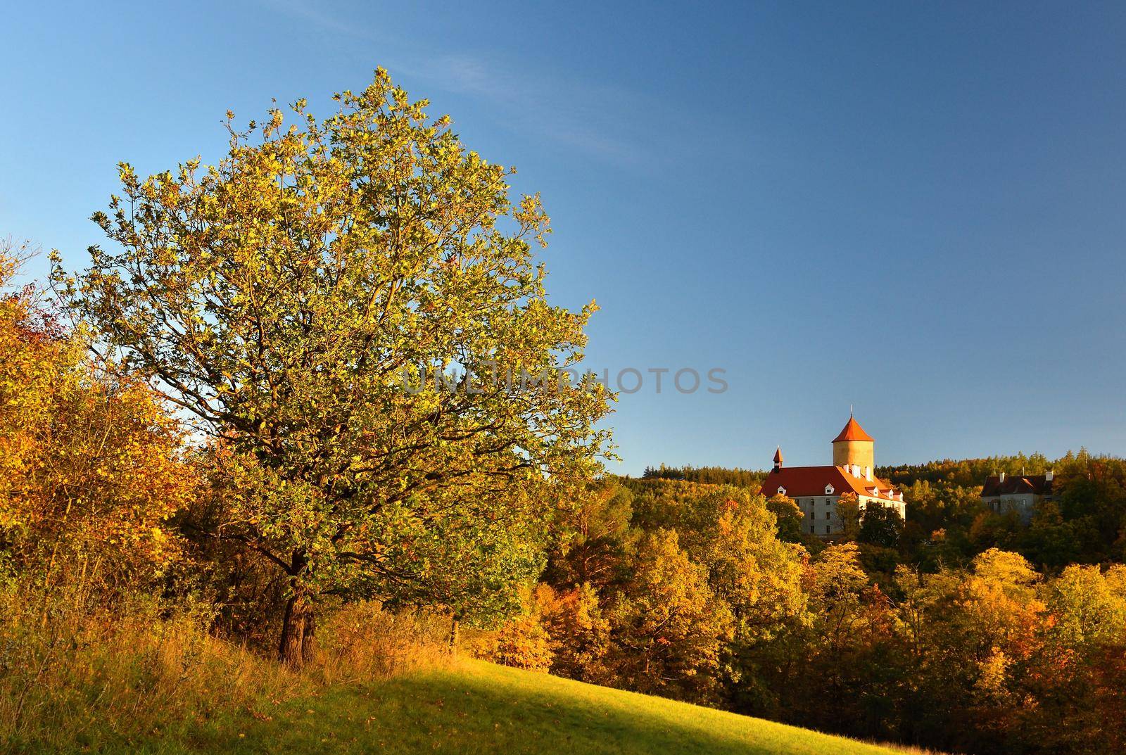 Beautiful Autumn Landscape with Veveri Castle. Natural colorful scenery with sunset. Brno dam-Czech Republic-Europe.