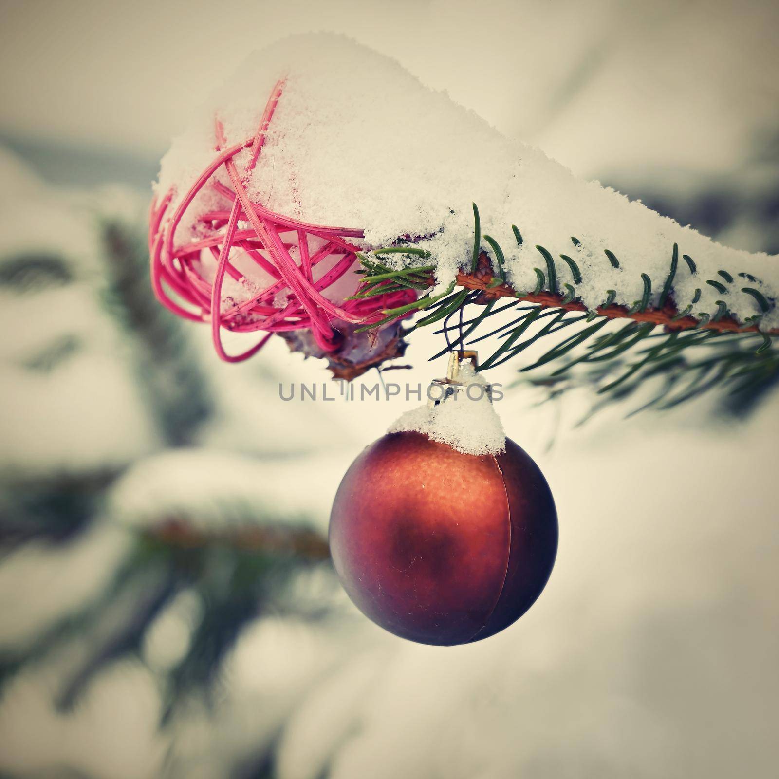 Christmas. Beautiful Christmas ornament on the Christmas tree. Seasonal background for winter holidays.