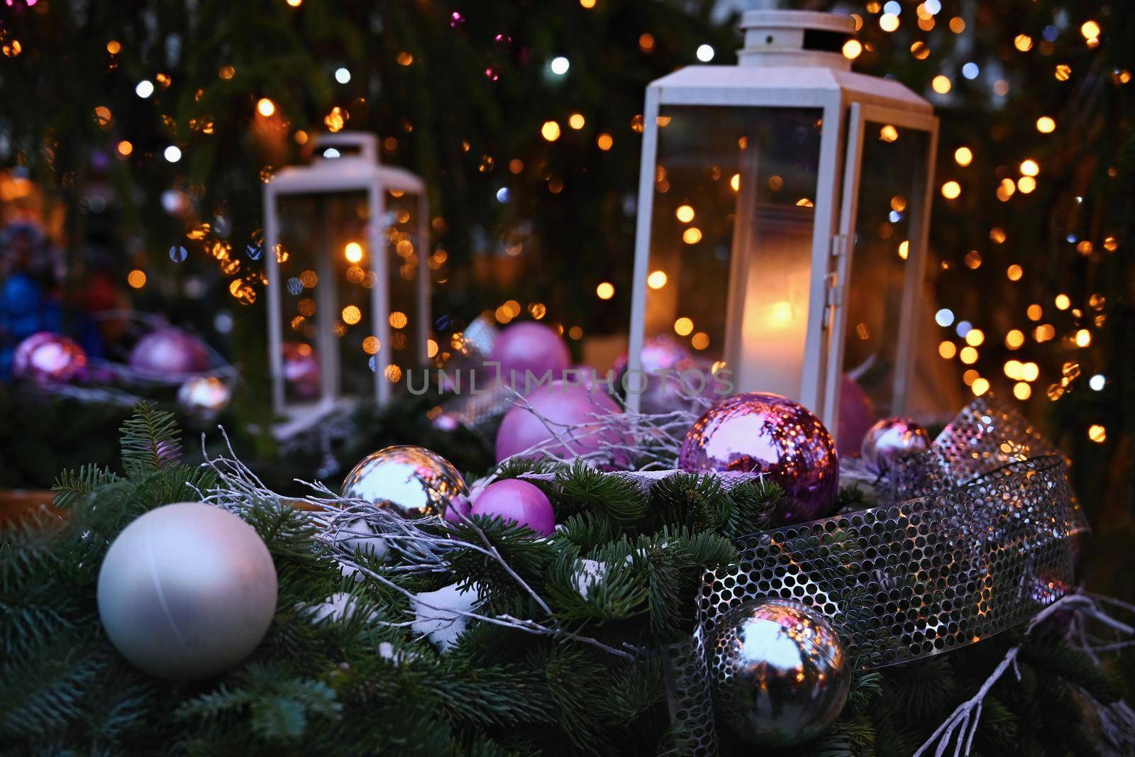 Christmas. Beautiful Christmas ornament on the Christmas tree. Seasonal background for winter holidays.