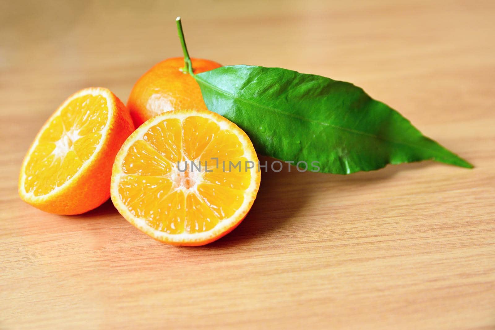 Beautiful fresh fruit - tangerine. Isolated on a clean background. by Montypeter