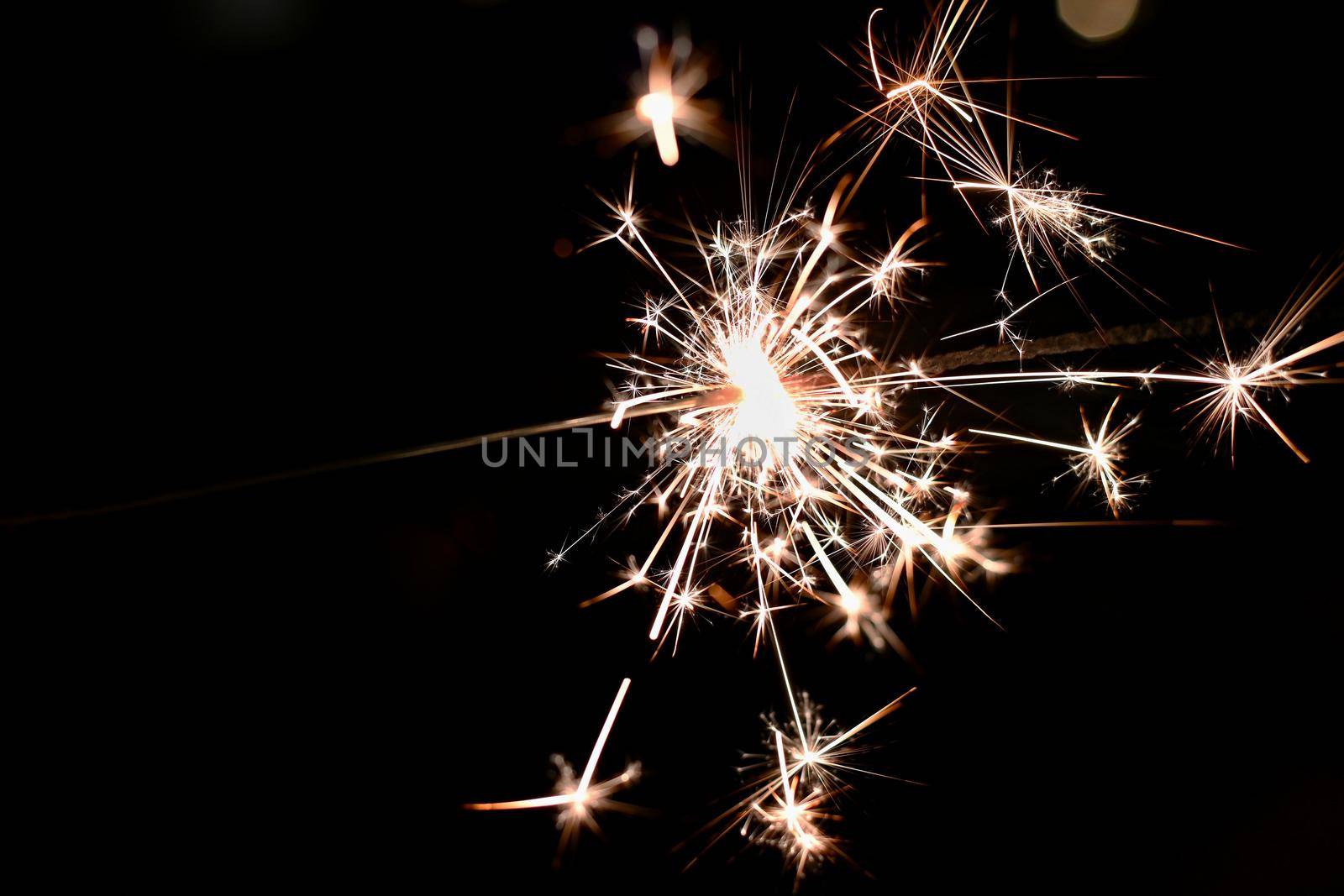 Beautiful abstract shot of sparklers on black background.